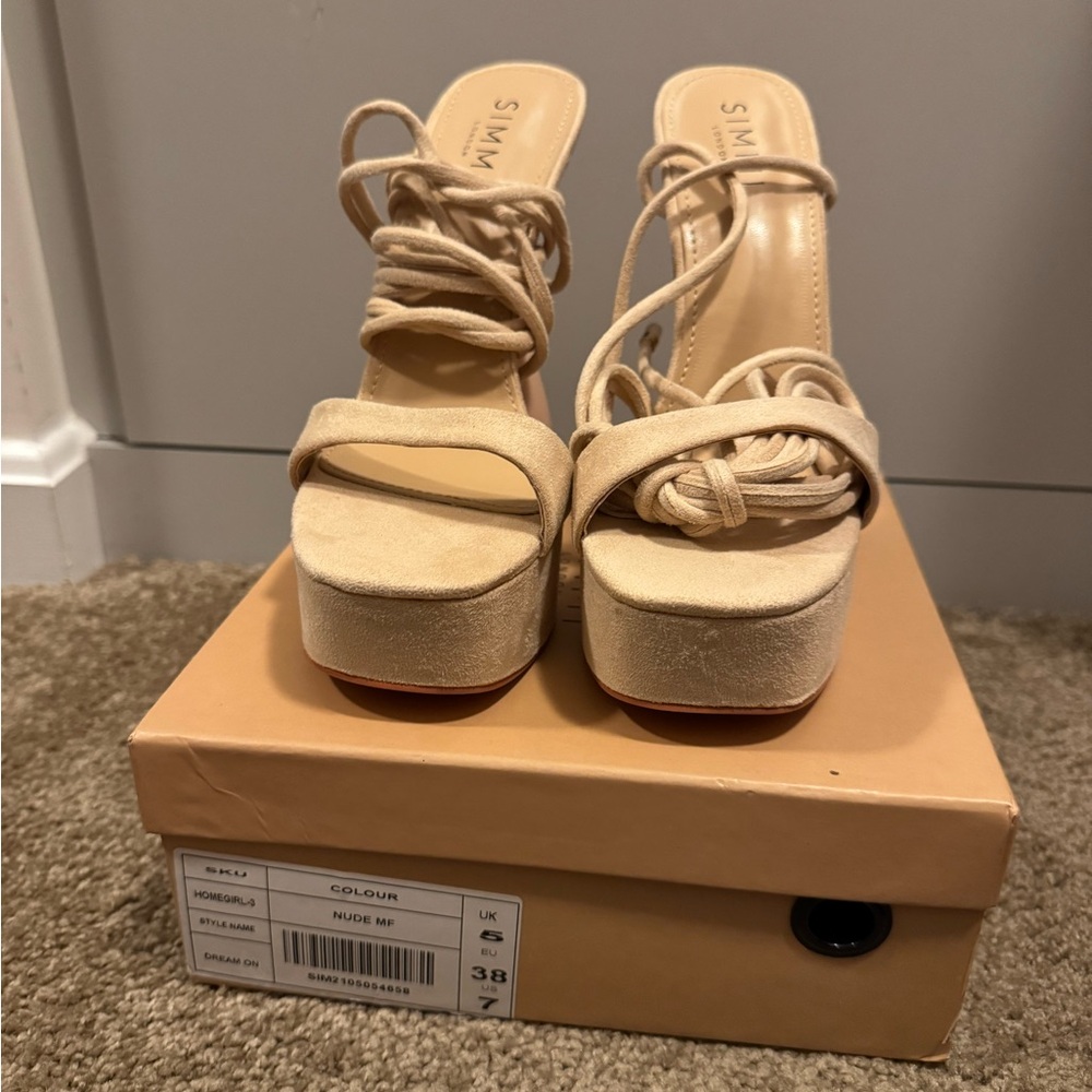 Simmi brand high heel  wrap around platform size 7.
